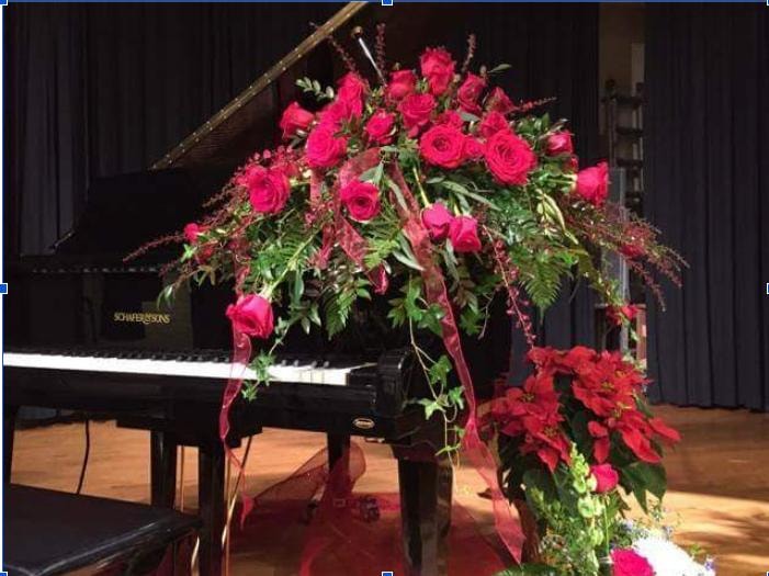 Schafer & Sons grand piano with floral arrangement — In Memoriam
